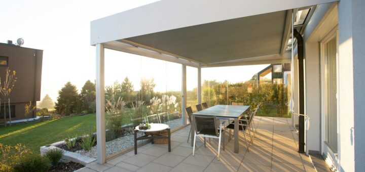 black metal table and chairs on green grass field during daytime